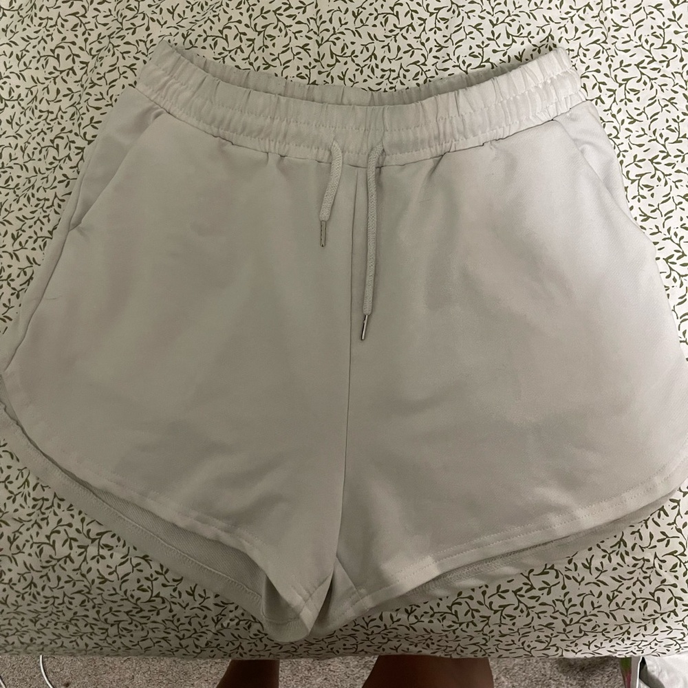 White sweat shorts